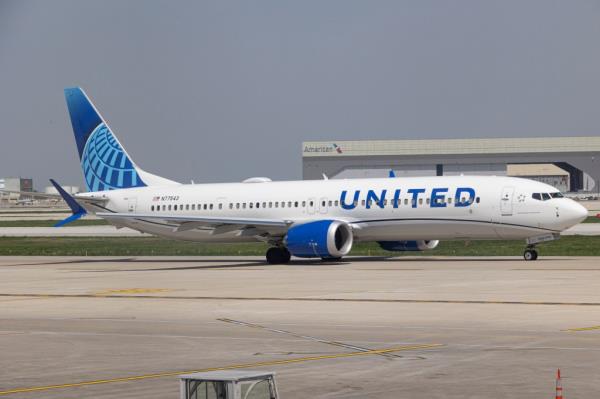 A United Airlines flight was forced to make an emergency landing after a passenger collapsed in the bathroom.