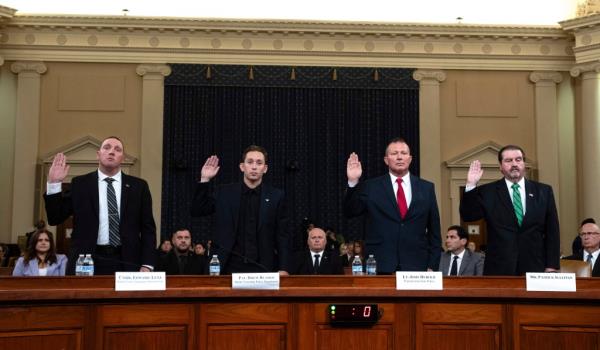 From left, Sgt. Edward Lenz, Commander of Butler County Emergency Services Unit, Patrolman Drew Blasko of Butler Township Police Dept., Lt. John Herold of Pennsylvania State Police, and former U.S. Secret Service agent Patrick Sullivan, swear in.